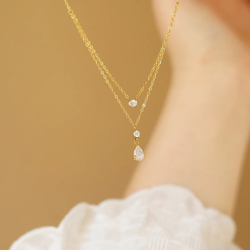 Collier Éclat de Goutte Double Chaîne Dorée en Acier Inoxydable & Zircon